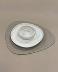 Oval bordstablett i beige – bild 2